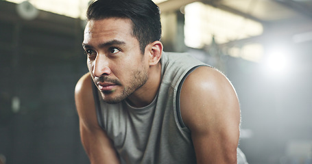 Image showing Sweat, fitness and man tired from gym, workout or rest in training in cardio, sports and body builder breathing with fatigue. Exhausted, break and athlete with commitment for health challenge