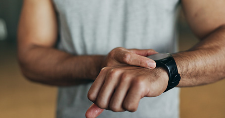 Image showing Smart watch, hands and man in gym for fitness, exercise results and workout performance. Stopwatch, closeup and check information, timer and tracking healthy training progress, clock and sports gear