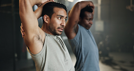 Image showing Men at gym together, stretching arms and muscle building strong body, balance and power in fitness. Commitment, motivation and focus, flexible bodybuilder in workout challenge with personal trainer.