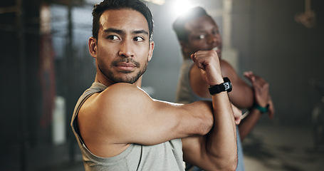 Image showing Men at gym together, stretching arms and muscle building strong body, balance and power in fitness. Commitment, motivation and focus, flexible bodybuilder in workout challenge with personal trainer.