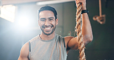 Image showing Fitness, gym and face of man with rope for training, bodybuilder exercise and intense workout. Sport, personal trainer and portrait of happy person with equipment for wellness, performance and muscle