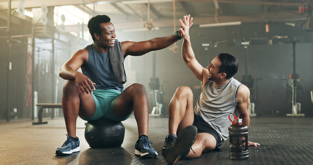 Image showing Happy man, high five and fitness in sports motivation, teamwork or partnership at the gym. People touching hands in workout, exercise or training together for physical health or wellness at gymnasium