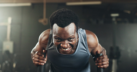 Image showing Black man at gym, weight sled and muscle endurance, strong body and core balance power in fitness. Commitment, motivation and bodybuilder in workout challenge for health and wellness on push machine.