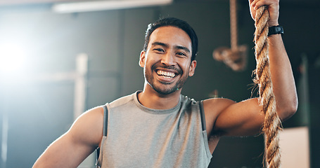 Image showing Fitness, gym and face of man with rope for training, bodybuilder exercise and intense workout. Sport, personal trainer and portrait of happy person with equipment for wellness, performance and muscle