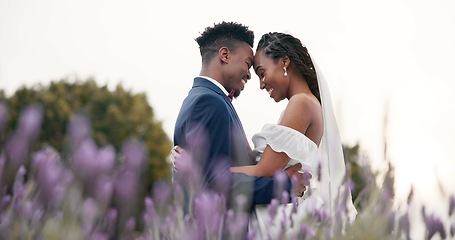 Image showing Wedding, bride and groom hug in a field, dancing and celebration of love with happiness and commitment. Marriage, trust and black people in relationship, event and nature with love and care outdoor