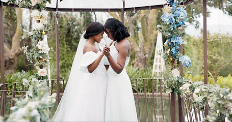 Image showing Wedding, lesbian and women dancing outdoor together at ceremony for celebration, happiness and romance. Marriage, love and lgbtq people embracing and moving with smile in elegant dress in nature