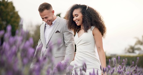 Image showing Wedding, bride and groom holding hands in meadow, celebrate love with happiness and commitment. Marriage, trust and people in interracial relationship, event and nature with love and care outdoor