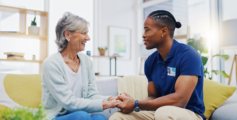 Image showing Black man, caregiver or old woman holding hands for support consoling or empathy in therapy. Medical healthcare advice, senior person or male nurse nursing, talking or helping elderly patient.