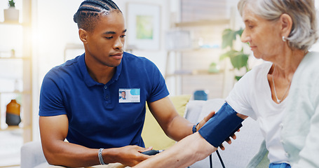 Image showing Caregiver, black man or old woman with blood pressure test consulting in hospital to monitor heart wellness. Healthcare, hypertension consultation or medical nurse with sick patient for examination