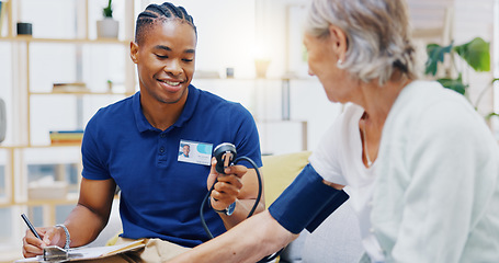 Image showing Caregiver, black man or old woman with blood pressure test consulting in hospital to monitor heart wellness. Healthcare, hypertension consultation or medical nurse with sick patient for examination