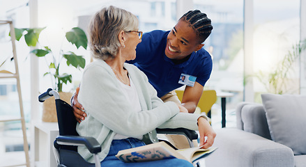Image showing Black man, caregiver or old woman in wheelchair talking or speaking in homecare rehabilitation together. Medical healthcare advice or male nurse nursing or helping elderly patient with disability