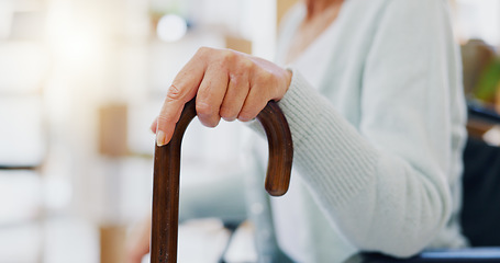 Image showing Hand, walking stick and closeup for woman in nursing home, living room or hospital for mobility support. Cane, crutch or rehabilitation for disability, stroke or injury for elderly lady with problem