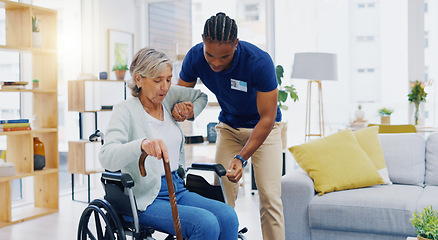 Image showing Help, home care and a woman with a caregiver and a wheelchair for disability, support and consulting. Happy, talking and a black man or male nurse helping a senior patient into a chair for nursing