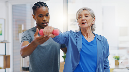 Image showing Senior woman, nurse and rehabilitation with dumbbells exercise in a nursing home for fitness. Elderly patient with a therapist man for healing, health and physiotherapy for arms, muscle and body