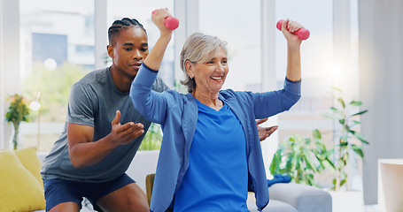 Image showing Rehabilitation, strong and woman with a physiotherapist for exercise, strength training and support. Help, fitness and a senior patient lifting dumbbells with black man in physiotherapy for recovery