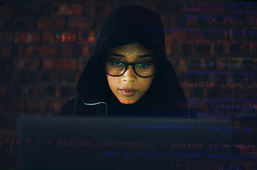 Image showing Hacker, woman in basement and laptop, coding and IT with code overlay, database with phishing and cyber crime. Cybersecurity, programming or hacking, criminal with pc for ransomware and firewall