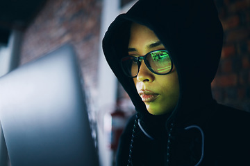 Image showing Hacker, woman in dark room with laptop and coding, phishing and cyber crime with IT database or server. Cybersecurity, programming and criminal with pc in basement, ransomware and hacking firewall