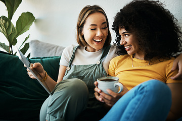 Image showing Couple, sofa and women relax with tablet and coffee for social media, internet and watching videos. Love, lgbtq and happy people in living room for bonding, relationship and streaming movies online