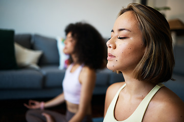 Image showing Women, fitness friends and meditation with mindfulness, wellness and peace of mind with breathing at home. Yoga, spiritual and calm in living room with healing and zen, exercise and self care