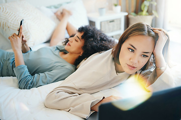 Image showing Laptop, social media and morning with a lesbian couple in bed together in their home on the weekend. Diversity, computer and an lgbt woman browsing with her girlfriend in the bedroom for love