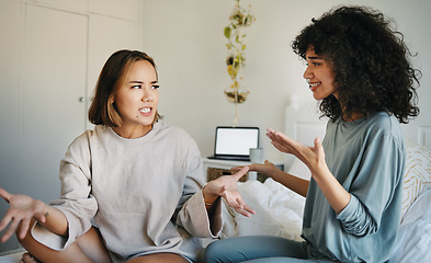 Image showing Lgbtq, women and couple argue in bedroom of home with conflict, crisis or problem in relationship. Lesbian, partner and girl on bed with stress, anxiety and depressed for argument, divorce or fear