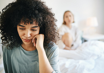 Image showing Lgbtq, woman and sad for couple fight in bedroom of home with conflict, crisis or problem in relationship. Lesbian, partner and girl on bed with stress, anxiety and depressed for argument and divorce