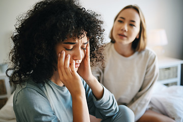 Image showing Lgbtq, woman and depression for couple fight in bedroom of home with conflict, crisis or problem relationship. Lesbian, partner and girl on bed with stress, anxiety and sad for argument and divorce