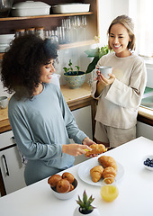 Image showing Couple, happiness and women with coffee and cooking in kitchen for breakfast, nutrition and vitamin c in morning. Food, people and smile with tea and pajamas or natural face for wellness or bread