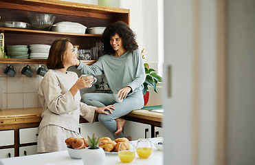 Image showing Lgbtq, women and couple with love in kitchen for breakfast, nutrition and vitamin c in the morning. Food, people and happiness with coffee and pajamas or natural face for wellness, romance and care