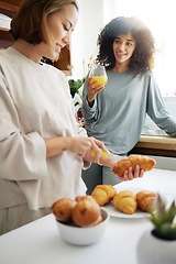 Image showing Couple, happiness and women with juice and food in kitchen for breakfast, nutrition and vitamin c in morning. Cooking, people and smile with drink and pajamas or natural face for wellness or fruit