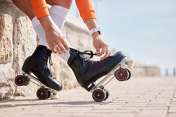 Image showing Tie, shoes and hands of woman with roller skates outdoor for exercise, workout or training with wheels on sidewalk. Fun, sport and person start fitness with rollerskating and cardio in summer