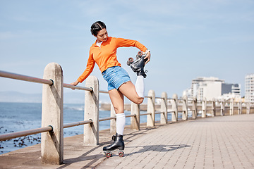Image showing Roller skate, stretching and space with a girl at the promenade on a blue sky background for the weekend. Fitness, beach and balance with a young person skating outdoor during summer on banner mockup