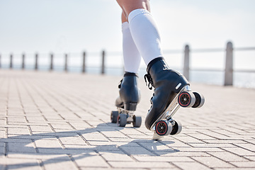 Image showing Person, roller skate and exercise in closeup for summer, alone or back view with skill, balance and sport. Model, caucasian and boardwalk for fitness, activity or wellness in race, cardio or health