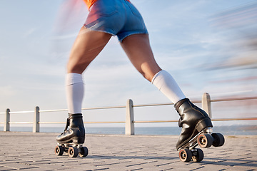 Image showing Person, roller skate and fun for summer in closeup for wellness, training or activity for sport. Caucasian, model and fitness on boardwalk, beach and speed for balance, race or competition by alone