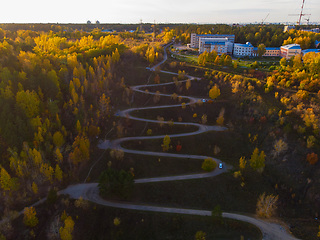 Image showing Aerial top vew of winding road in the city