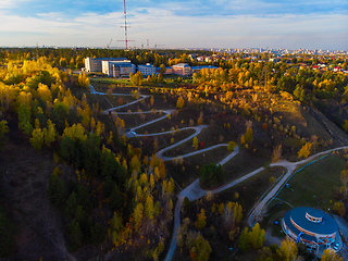 Image showing Aerial top vew of winding road in the city