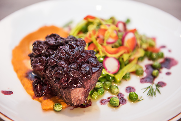 Image showing Roasted beef with berries sauce