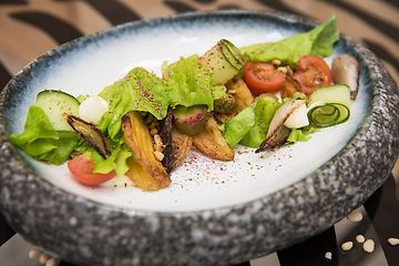 Image showing Salad with fried potato