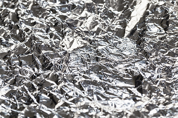 Image showing thin and crumpled shiny aluminum foil,