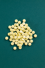 Image showing yellow solid tablets