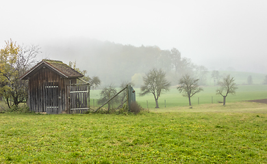 Image showing rural scenery with implement shed