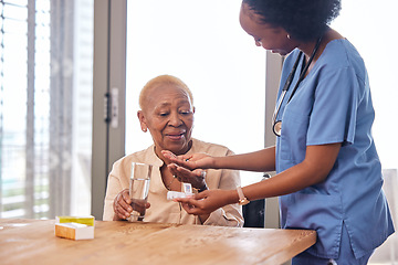 Image showing Nurse giving old woman pills in home with water for healthcare, wellness and help. Caregiver, medicine and African patient with glass to drink medical drugs, vitamins and supplements in retirement