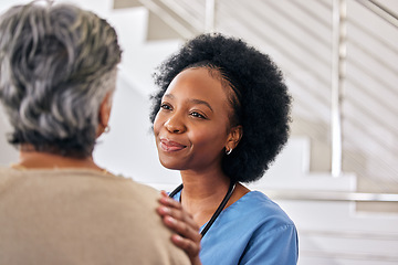 Image showing Old woman, nurse and care with conversation, support and happiness with healthcare, smile and treatment. Comfort, African person and medical professional with senior patient, trust and caregiver