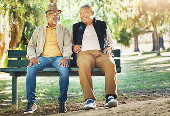 Image showing Senior friends, men and smile at park bench, talking and bonding outdoor to relax. Happy elderly people sitting together in garden, communication and conversation in nature for retirement in spring