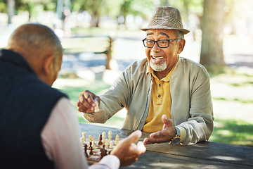 Image showing Elderly men in park, chess game and winner of competition or challenge, friends in retirement and happiness. Achievement, success and contest outdoor, moving piece for checkmate and problem solving