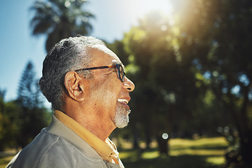 Image showing Happy, profile and senior man in park, nature and outdoor adventure in retirement, holiday or vacation in sunshine. Elderly person, happiness and smile in summer, forest or woods with wellness