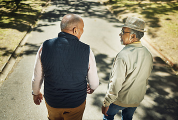 Image showing Senior, friends talking and walking in park, nature and outdoor in retirement with support and communication. Elderly, men and above people on sidewalk in New York with conversation and community