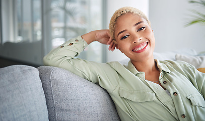 Image showing Happy, woman and portrait at home of freelancer relax with a smile on a living room couch. Female person, calm and thinking in a house with remote work break and rest on a lounge sofa with peace