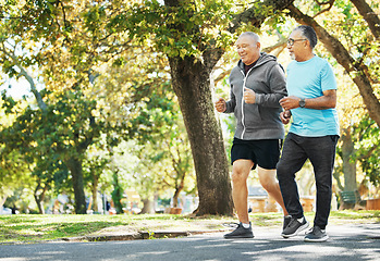 Image showing Elderly, men and running for fitness in road of city for wellness, exercise or workout outdoor with smile. Senior, people and training together in nature or park for health, adventure and happiness