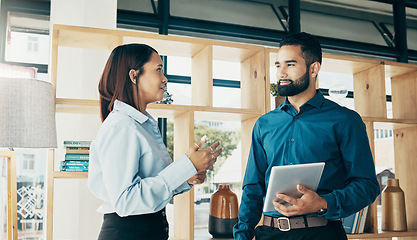 Image showing Business people, smile and tablet with communication for meeting, collaboration and partnership in office. Professional, man and woman with touchscreen or discussion for recruitment at workplace